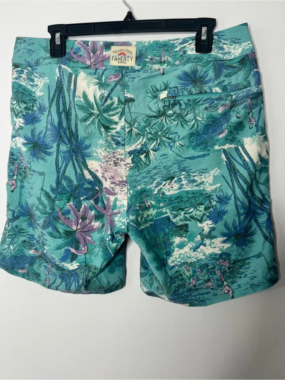 Faherty board shorts featuring a tropical print size 32